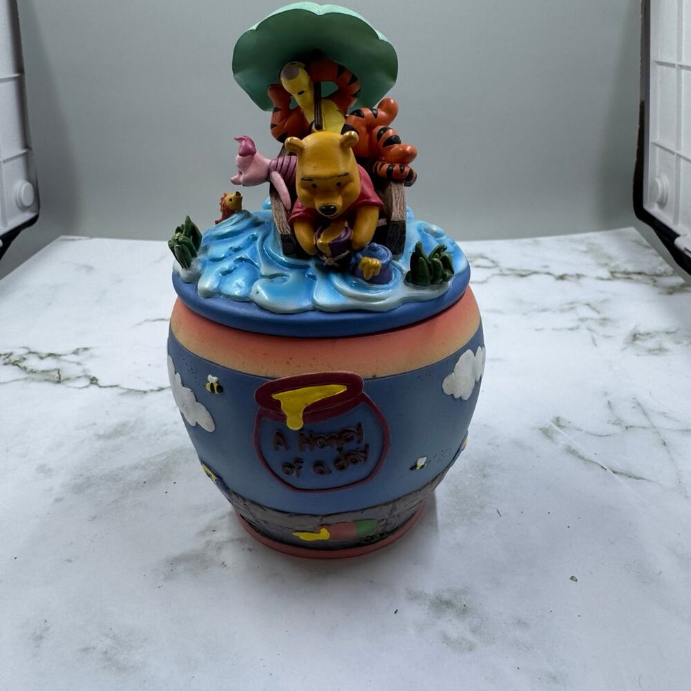 Winnie the pooh a honey of a day music box